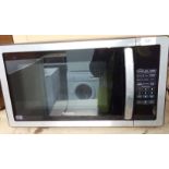 A Kenwood K25MSS11 microwave appliance