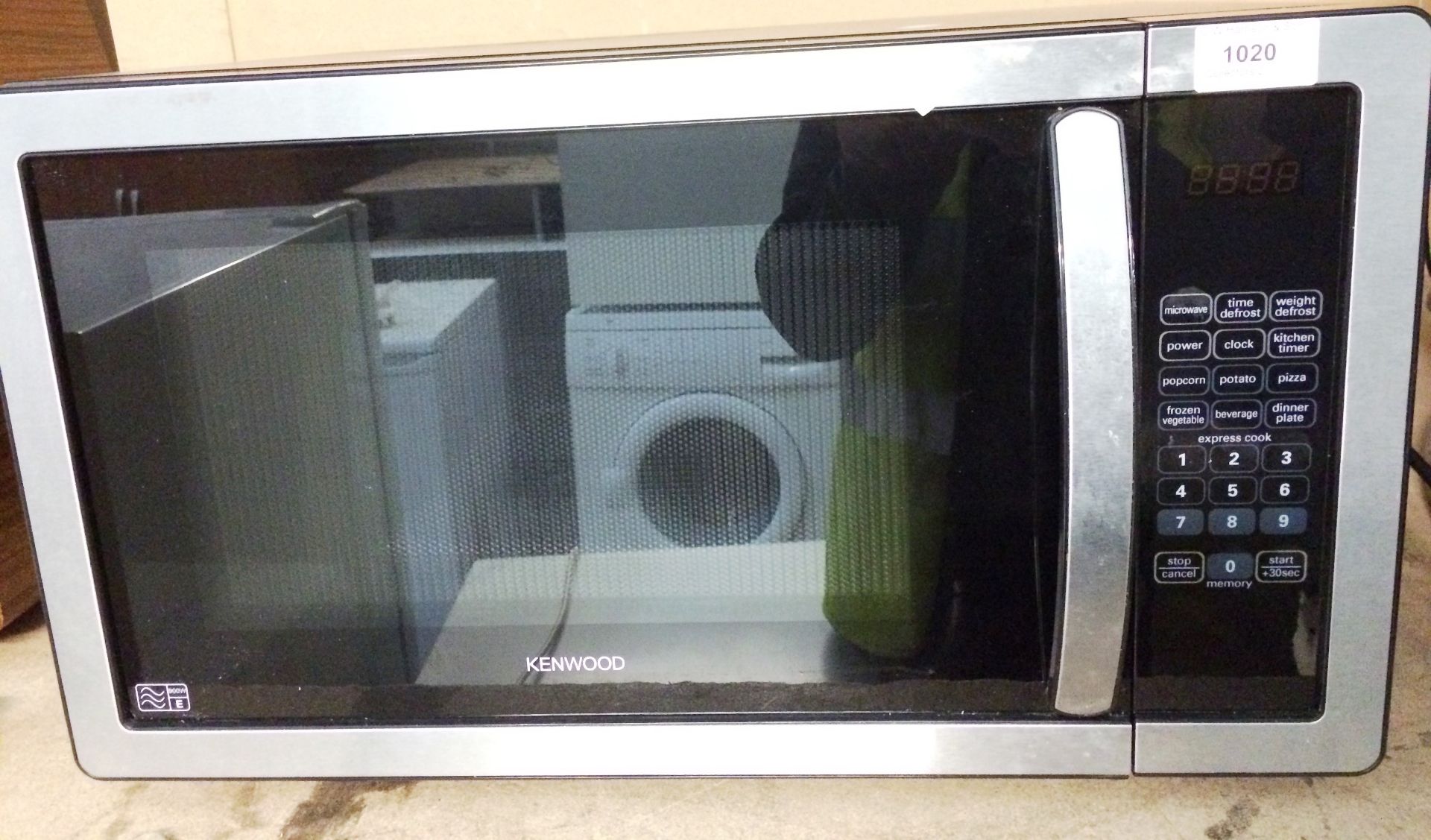 A Kenwood K25MSS11 microwave appliance