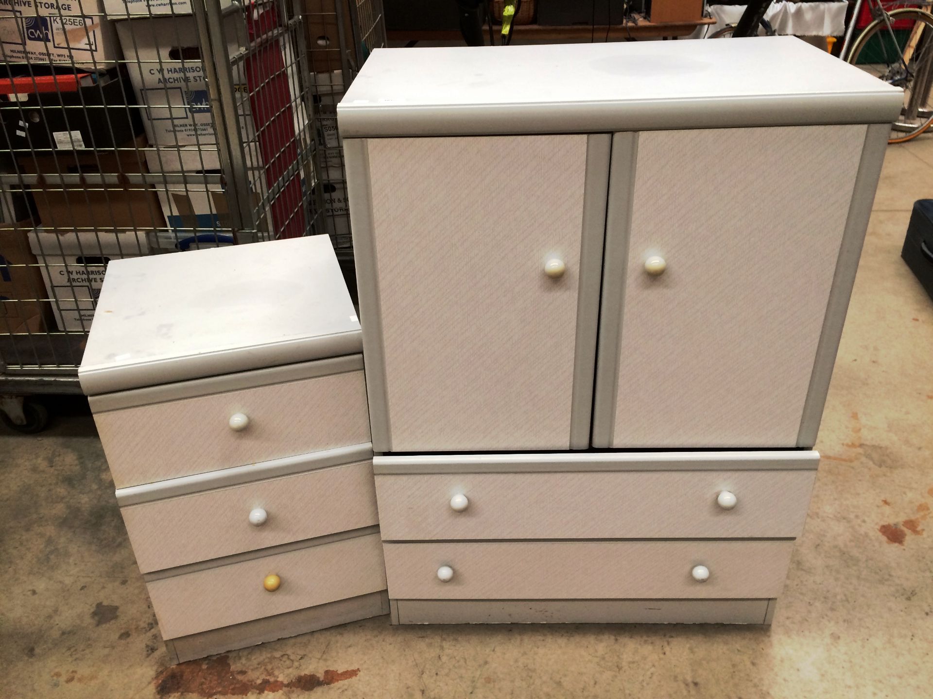 A grey melamine two door two drawer bedroom unit 80cm x 108cm high and matching three drawer