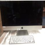 An Apple i-Mac 21.5" computer, 2.