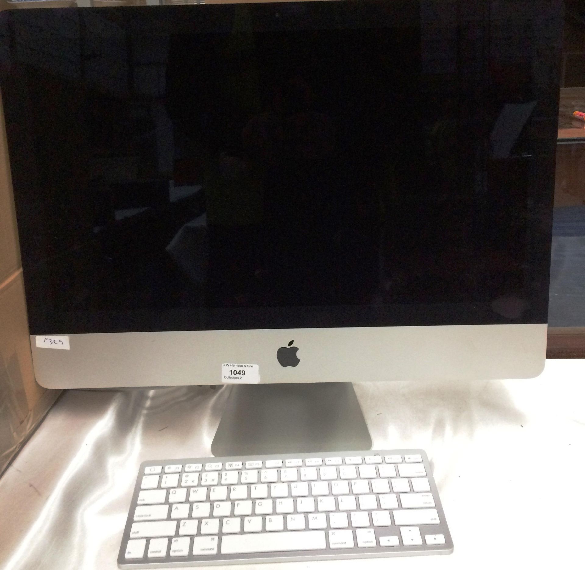 An Apple i-Mac 21.5" computer, 2.