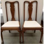 A pair of mahogany Queen Anne style dining chairs