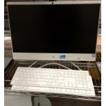 An HP All-in-one 22 desktop computer 13 2.