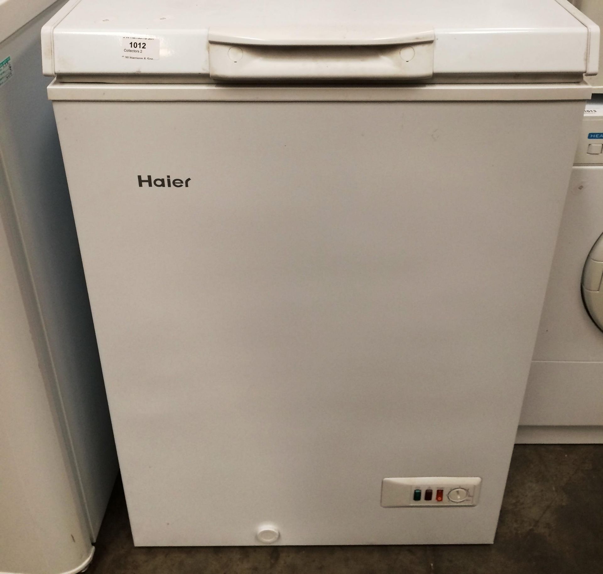 A Haier lift top small chest frezer