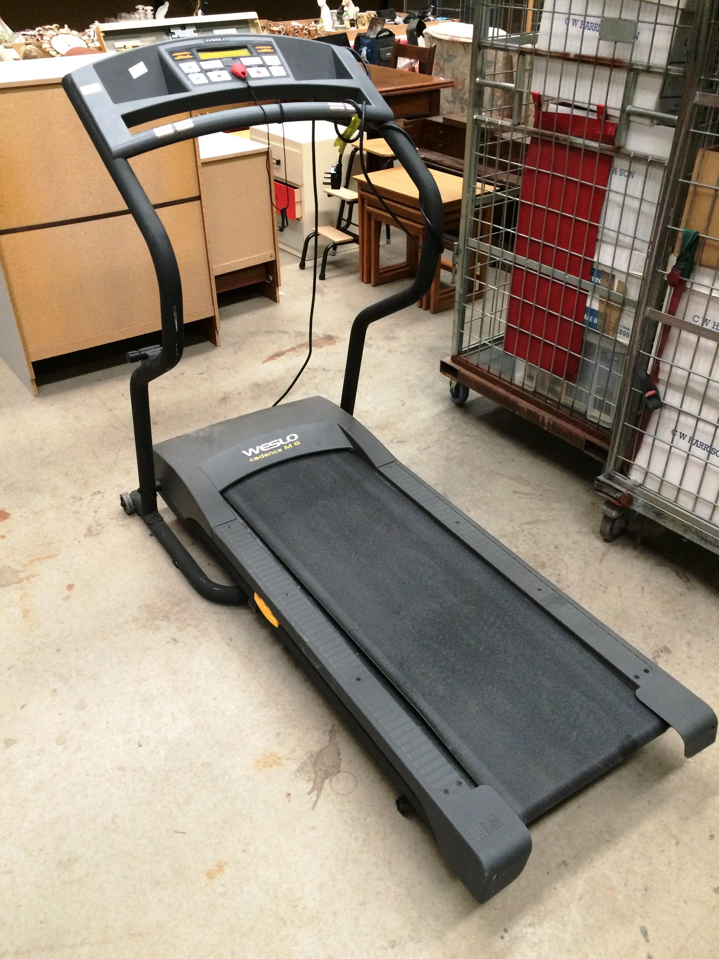 A Welso Cadence M6 running exercise machine with digital readout - 240v