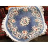 A blue patterned 100% wool pile circular Chinese rug 122cm diameter