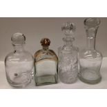 Four glass decanters