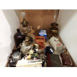 Contents to tray two brass and glass oil lamps, wall light, brown bottle, stoneware bed warmer,