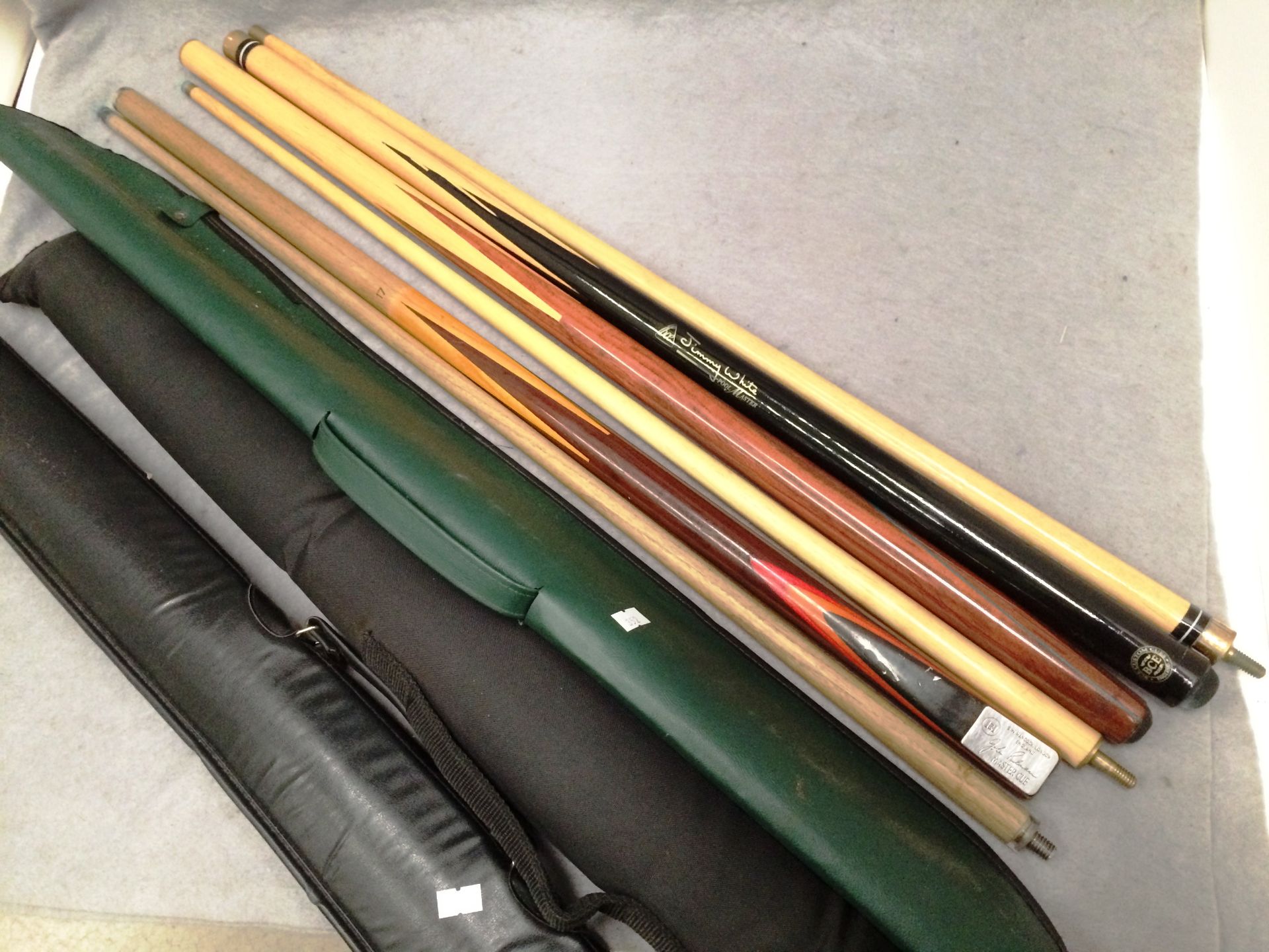Three two piece pool/snooker cues - one BCE with Jimmy White facsimile signature,