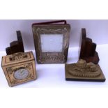 Four items a Skandetui Malmo Design Philipp Swedish decorated mantel clock, pair of book ends,
