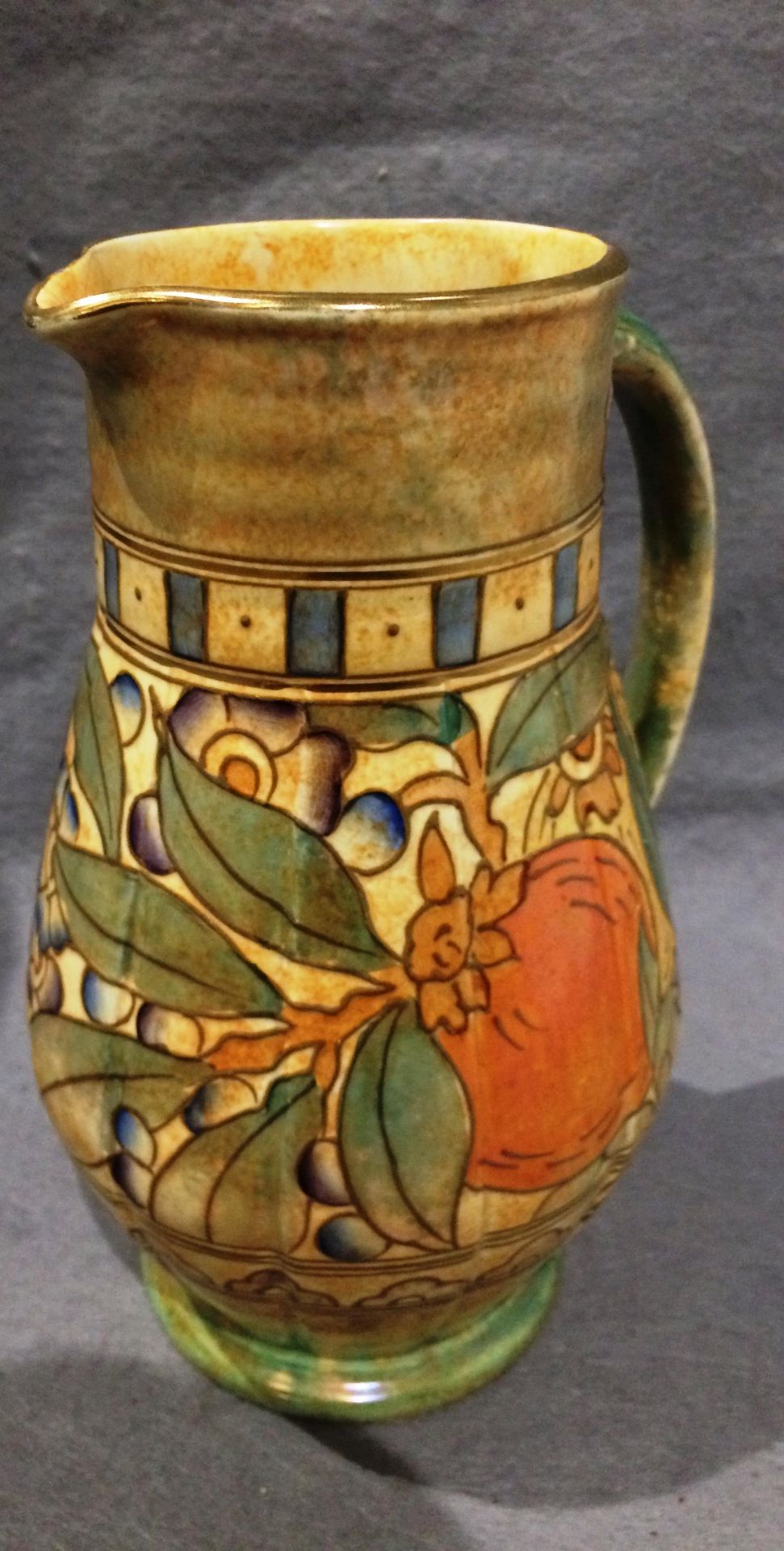 A Charlotte Rhead England Bursley ware fruit patterned jug Ref No. 653 ...