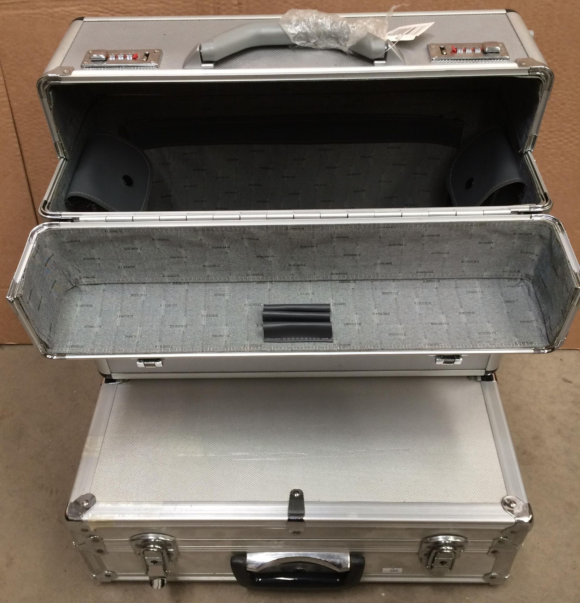 Two assorted aluminium tool boxes/cases