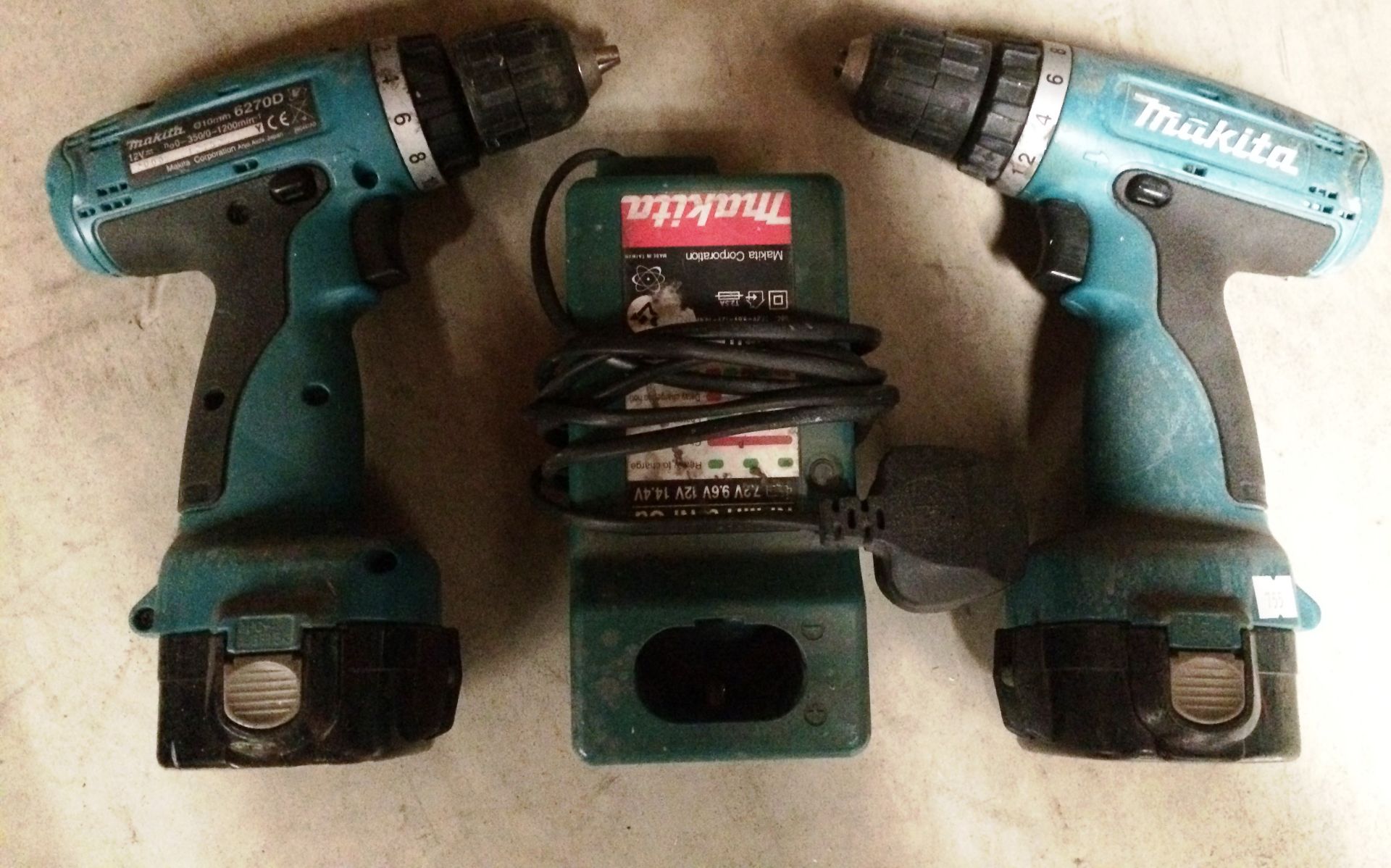 Two x Makita 6270D 12V cordless drills complete with two batteries and one charger
