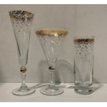 Five glass champagne flutes,