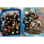 Contents to two small plastic boxes - approximately 80 various miniature spirits and liquers - some