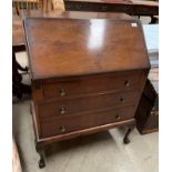 A walnut bureau with fall flap over three drawers on claw and ball feet 16 x 100cm high - no key