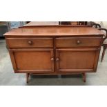 A Remploy oak two door two drawer sideboard 120cm