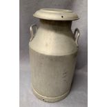 A galvanised two handled milk churn with lid 78cm high