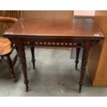 A mahogany swivel folding top card table with green baize lining 96 x 88cm when open on turned legs