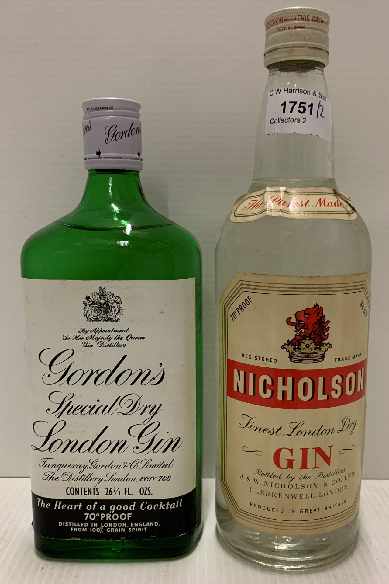 A 26 2/3fl.oz bottle of Gordons Special Dry London Gin (70% proof) and a 30 U.P.