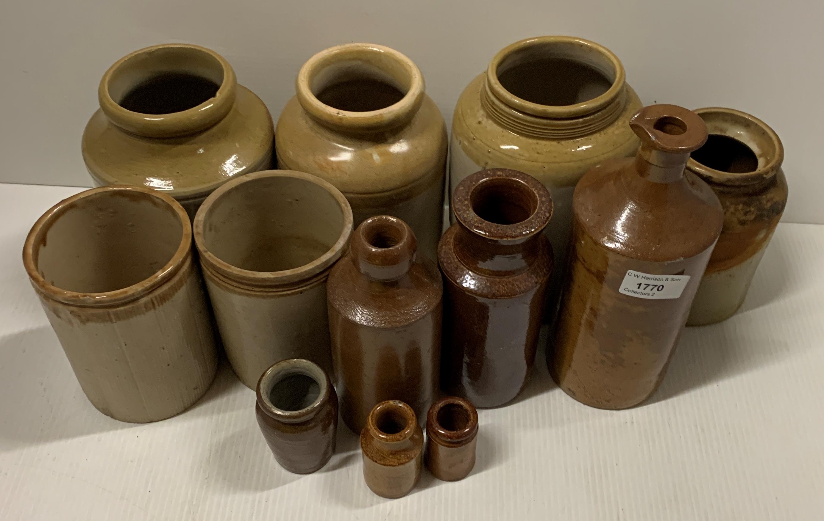 A collection of twelve various sized brown glazed stoneware storage jars and bottles - Image 2 of 2