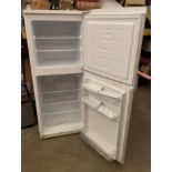A Beko upright fridge freezer