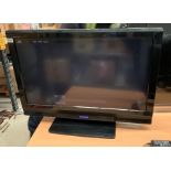 A Toshiba Regza 32AV635D 32" LCD TV complete with remote control