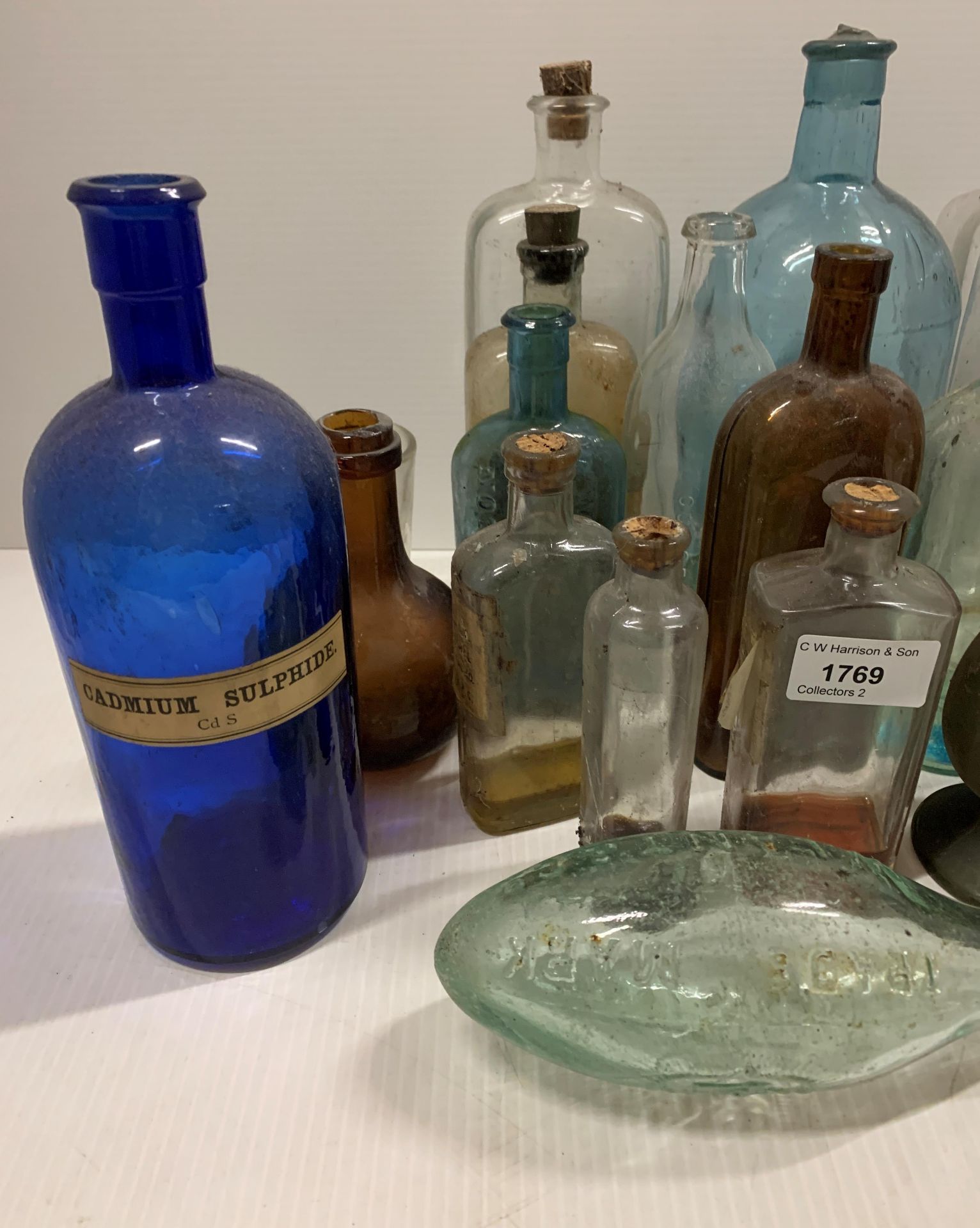 A collection of nineteen glass chemist and other bottles - some coloured, - Image 2 of 3