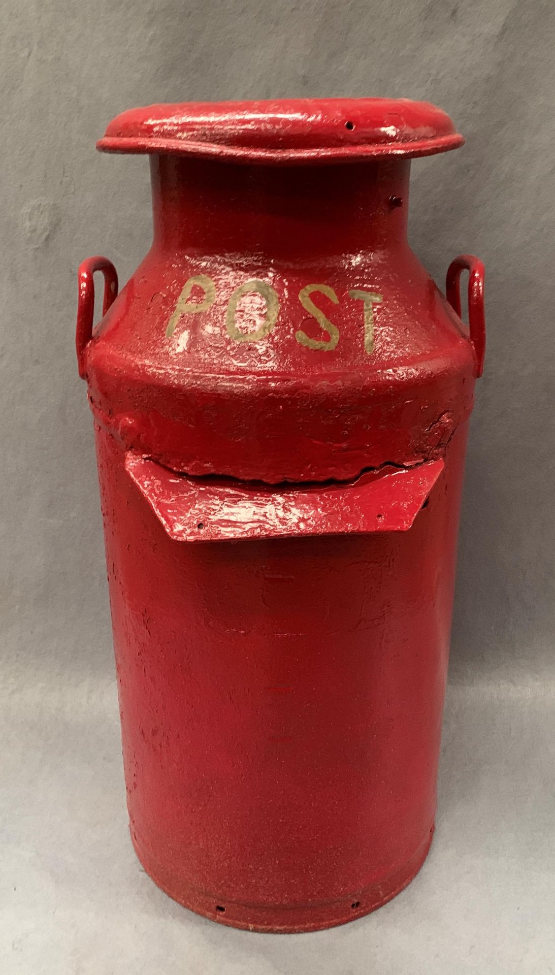 A red painted galvanised milk churn converted into a post box 72cm high