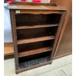 A carved oak open four shelf bookcase 70 x 110cm high