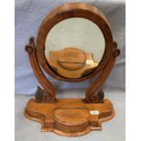 A walnut framed table top dressing table swing mirror