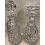 Two glass decanters with stoppers,