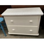 A white painted pine two drawer chest of drawers with later formica top 94 x 76cm high