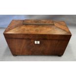 A walnut sarcophogus shaped tea caddy 32 x 20cm high complete with internal bowl (repaired) no key