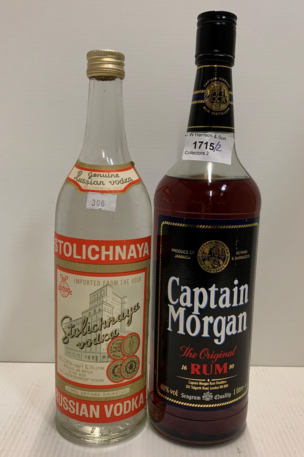 A one litre bottle of Captain Morgan Rum (40% volume) and a 0.