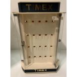 A Timex plastic three sided revolving watch display stand 53cm high x 40cm wide - no keys