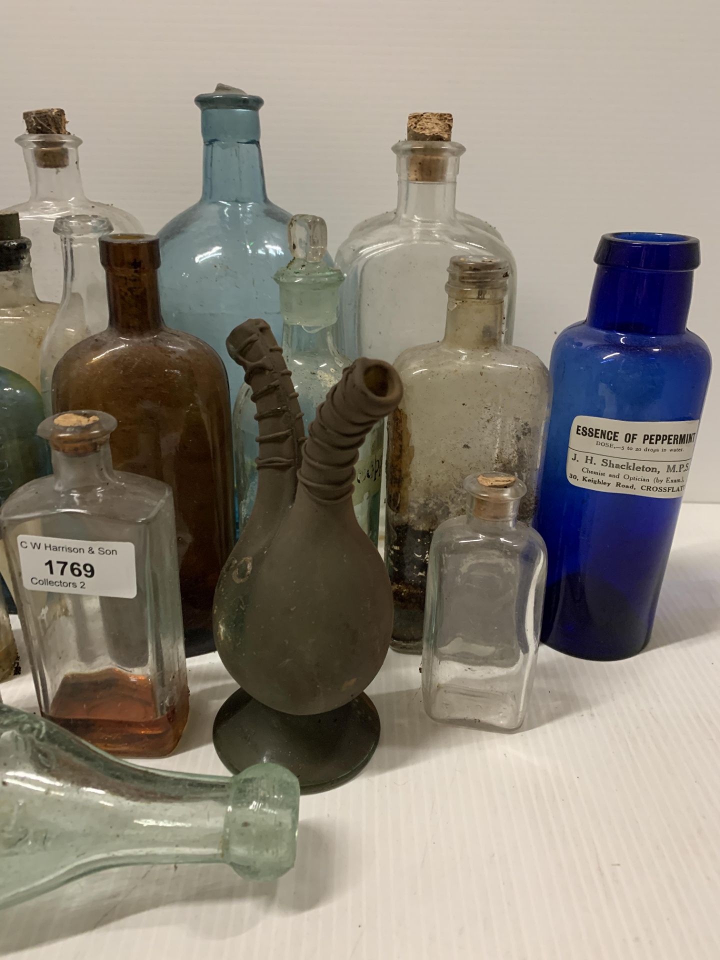 A collection of nineteen glass chemist and other bottles - some coloured, - Image 3 of 3