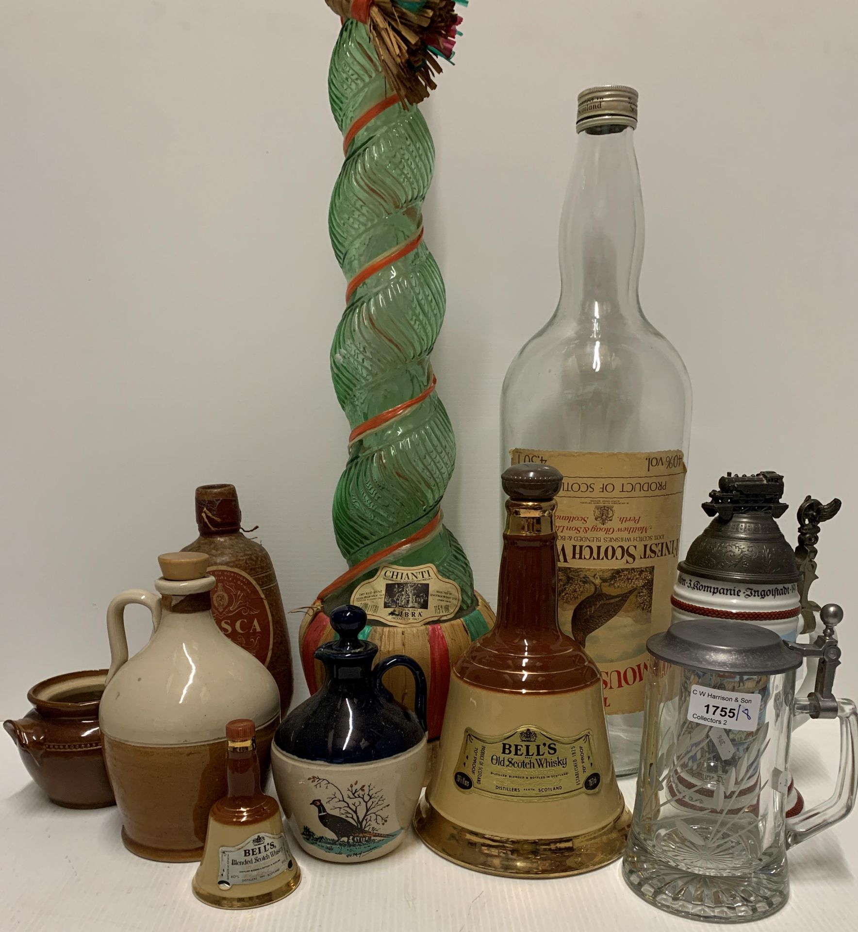 A Chianti green glazed spiral twist bottle, a 4. - Image 2 of 2