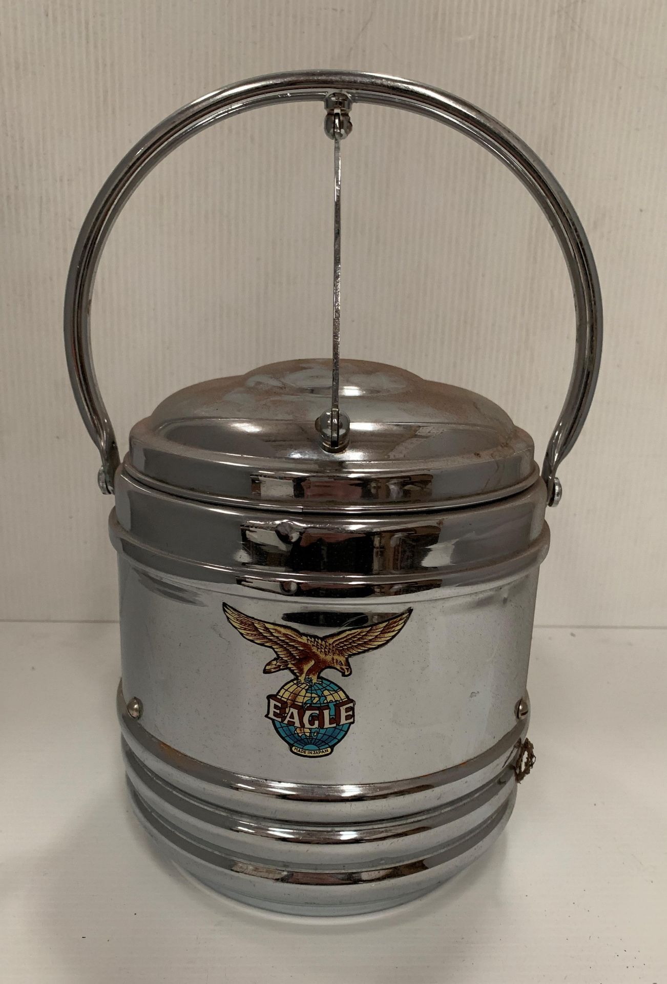 An Eagle chrome ice bucket - two small dints to front