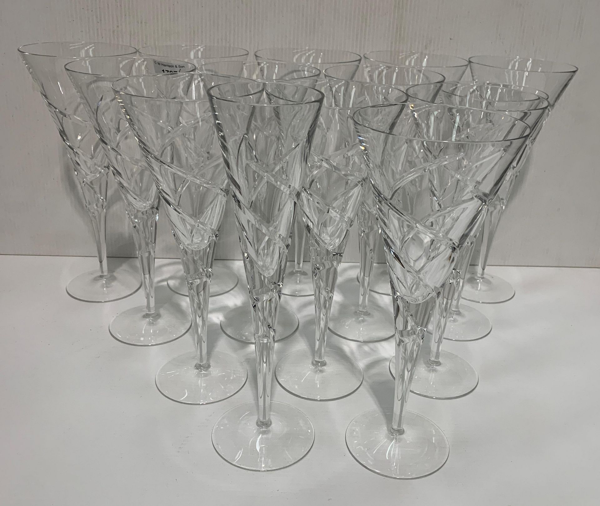 Twelve tall spiral twist cocktail glasses (each 26cm high),