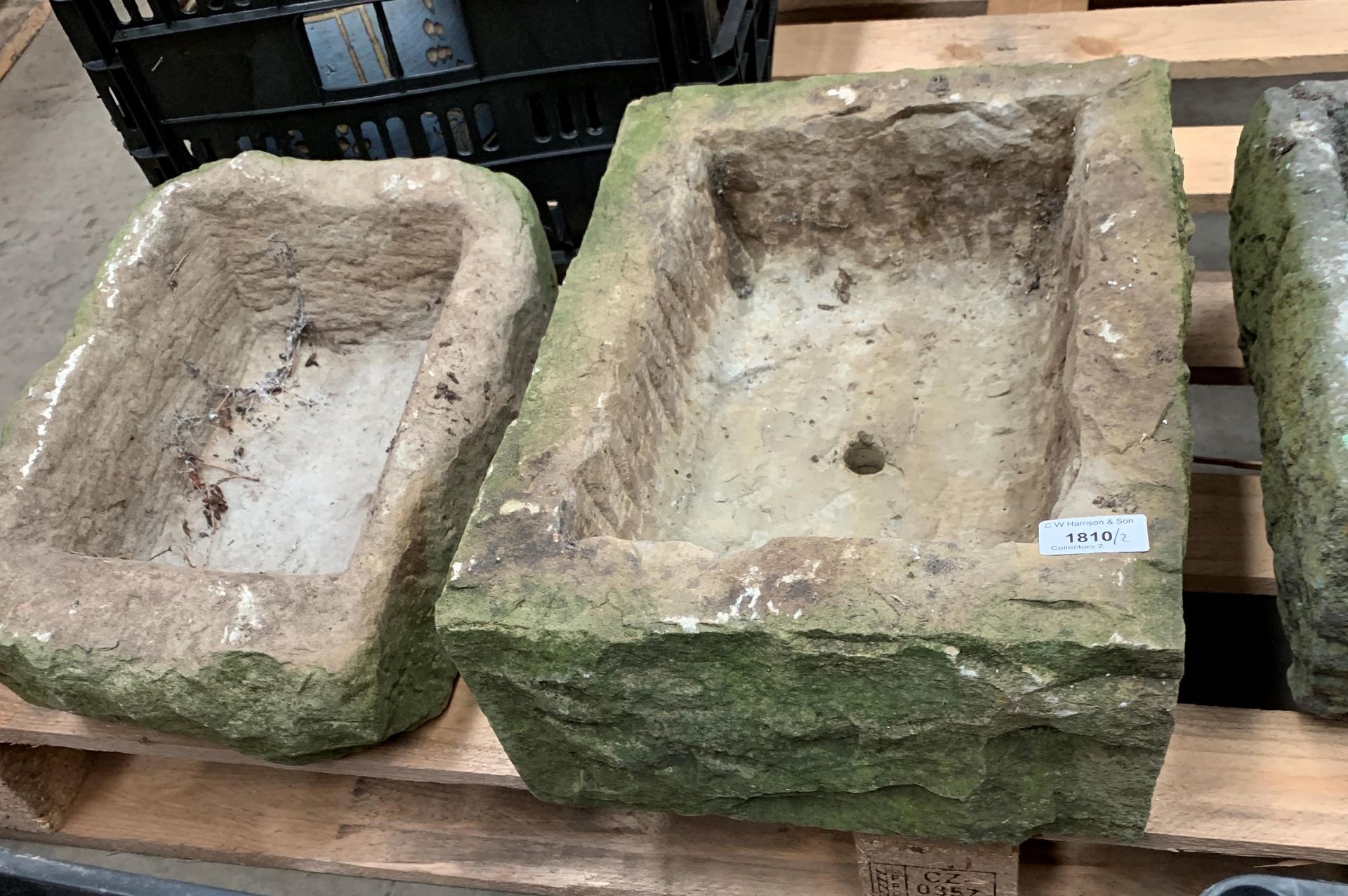 Two sandstone stone troughs the largest 38 x 36 x 15cm and the smaller 38 x 26 x 13cm