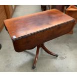 A mahogany two drawer drop leaf side table 88 x 85cm when extended on four splayed leg base