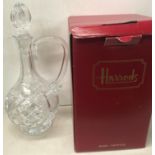 A Harrods hand crystal port decanter with stopper 32cm high,