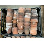 One plastic crate containing 97 old mainly hand thrown Terracotta plant pots,