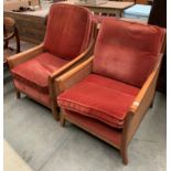 Two Parker Knoll Bergere style medium wood finish armchairs with pink upholstered seat and back