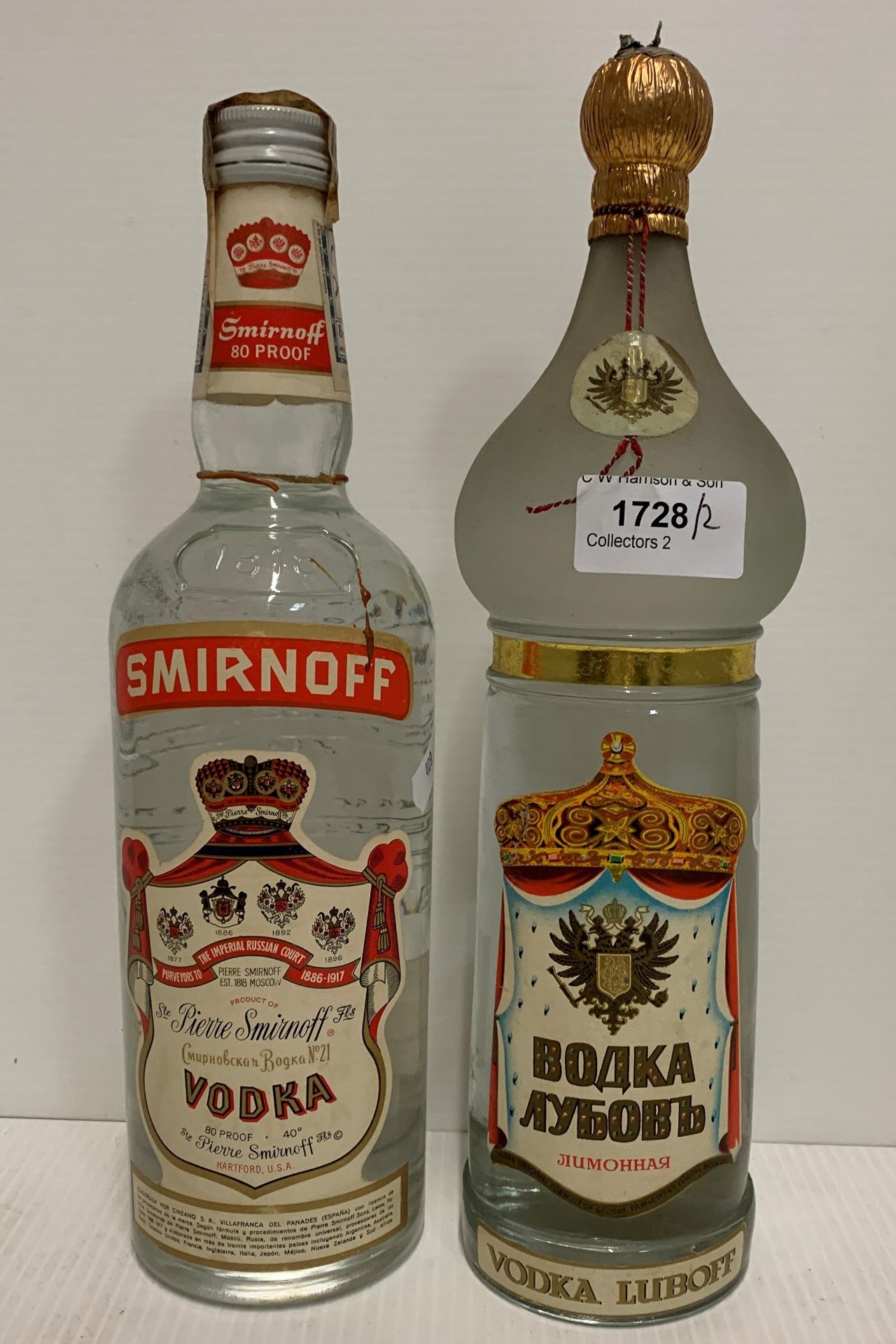 A bottle of 80% proof Smirnoff Vodka and a bottle of Boaka Luboff Vodka (2) Further