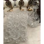 A glass dimpled decanter with stopper 26cm, together with six large brandy glasses,