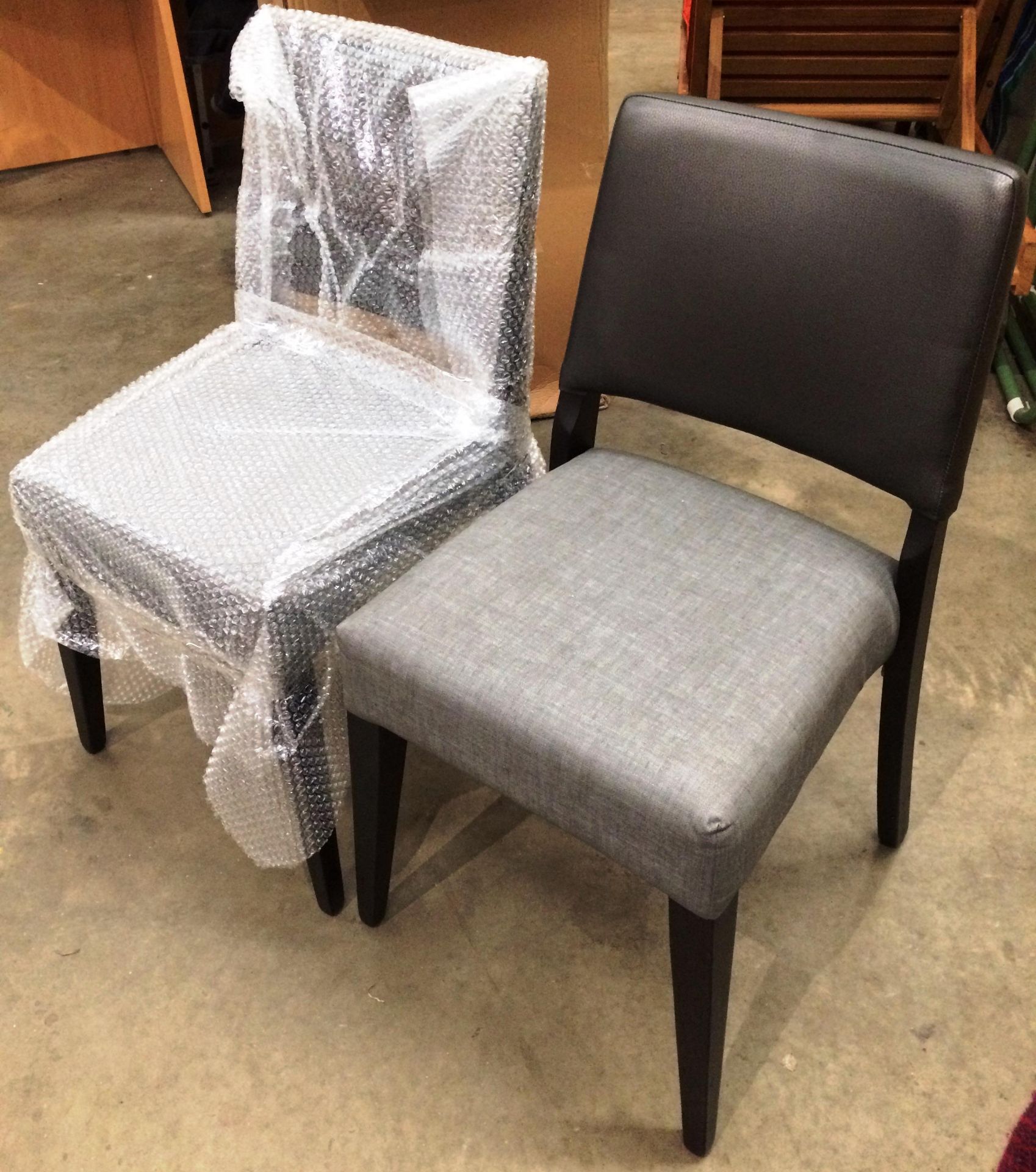 Two Reuben fully upholstered side/dining chairs seat in Kobe Springs II grey back in Dux Duke