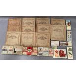 Eleven small Wills cigarette picture card albums containing Players 'Wild Birds',