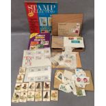 Contents to tray - two stamp collecting magazines,